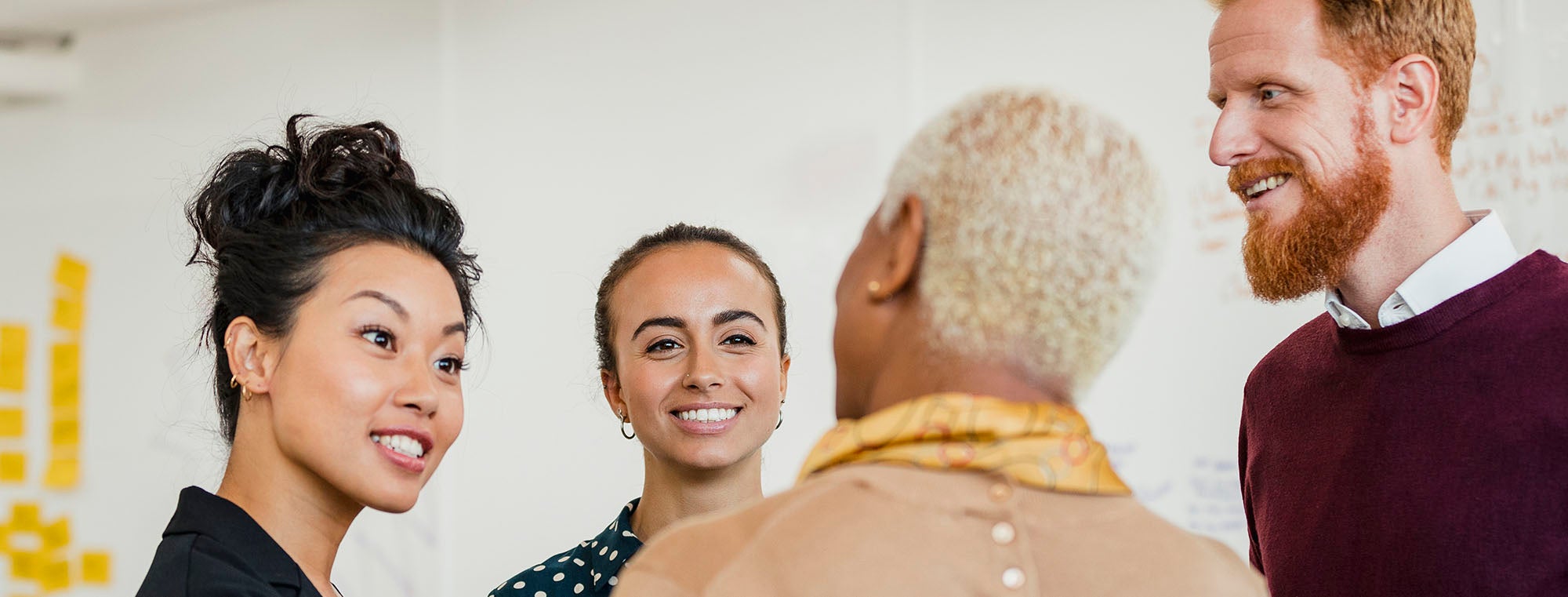 Professionals conversing in an office setting