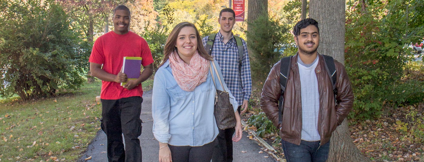 Photo of students walking on campus