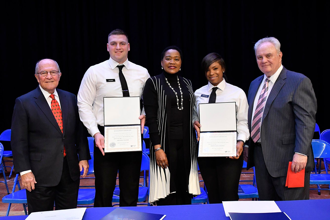 Photo of Police Academy graduates being honored