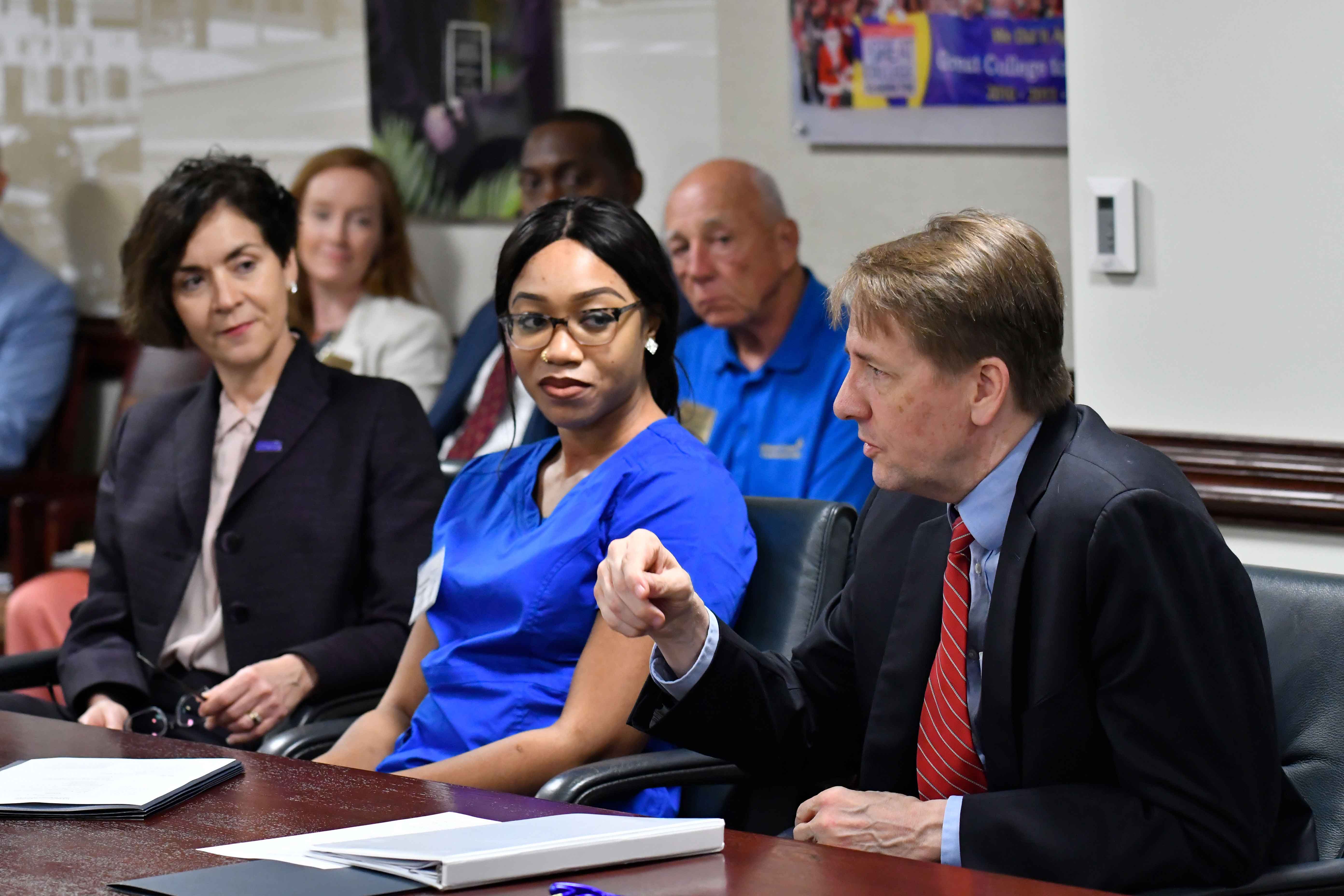 Mr. Cordray with Nurse Aide Student Mona Coulibaly