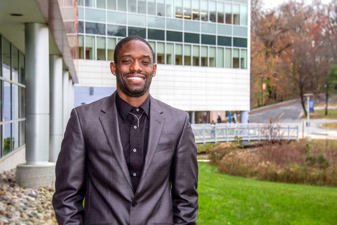 Photo of Frederick Shegog standing in from of the STEM building.