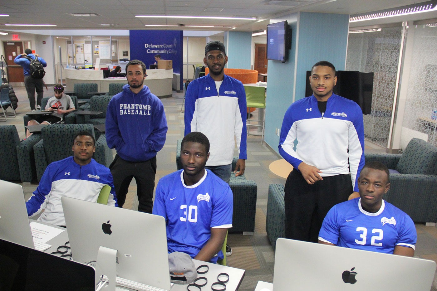 Student-athletes take the It’s On Us pledge. Front row from left to right: Amonie Holloman (Men's Basketball),  Demba Camara (former soccer player) and Abrahim Kromah (Soccer). Back row, left to right: Douglas Harrison-Oakleaf (Baseball), Saleem Chisholm (Men's Basketball) and Khayyir Laws (Men's Basketball)