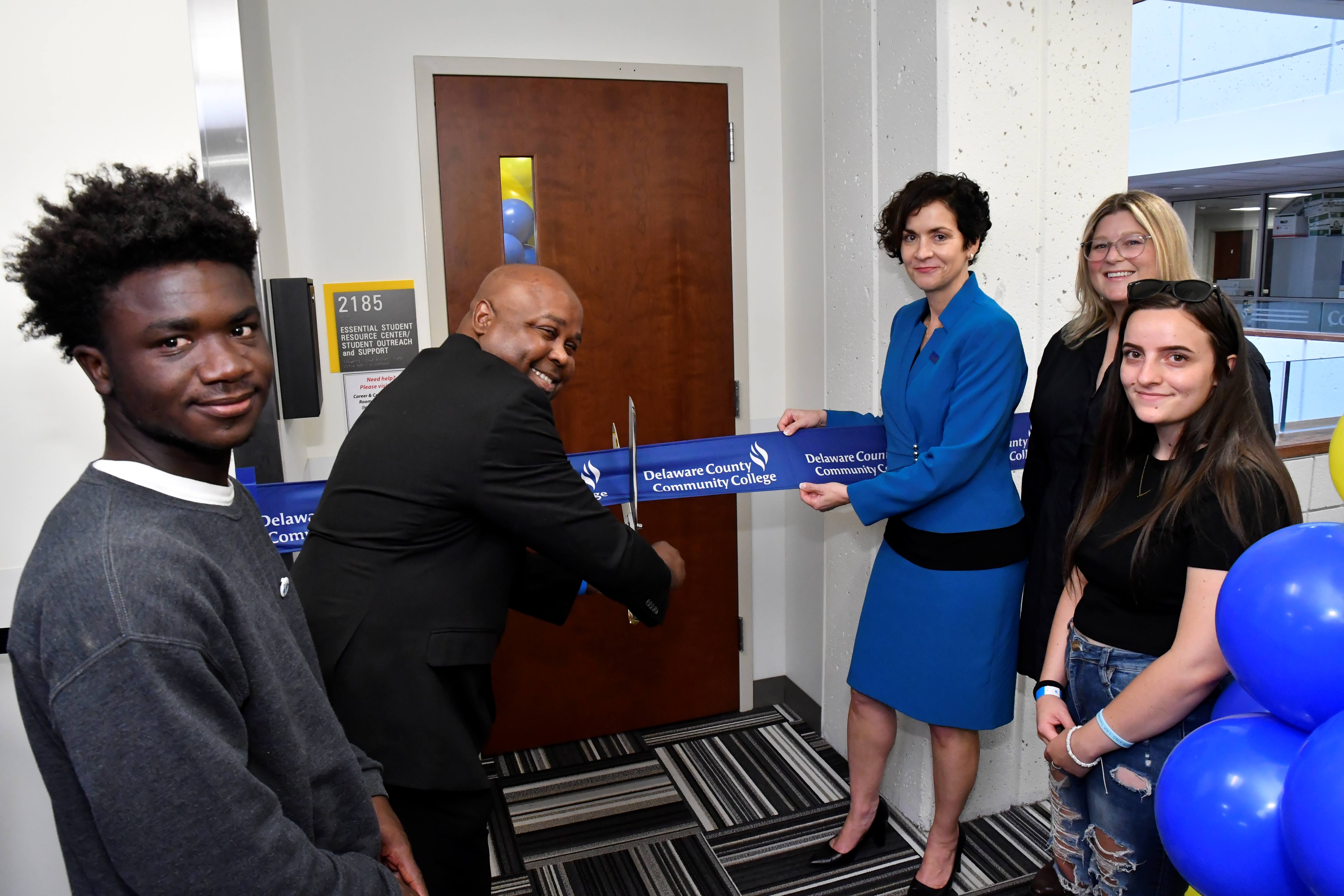 Ribbon-cutting photo with Dr. Mickens and Dr. Cronin