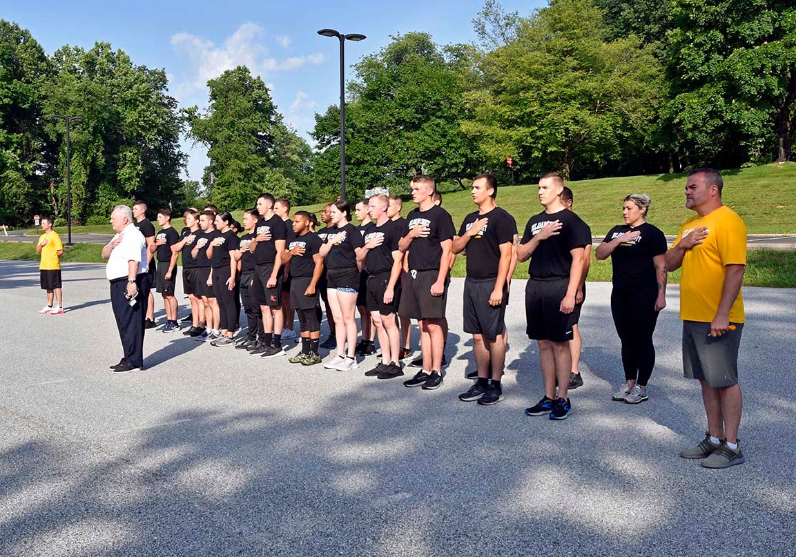 Municipal Police Academy cadets and their instructors start the Last Run by reciting the Pledge of Allegiance.