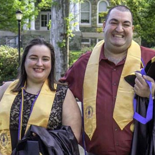 Grads posing for a photo after the ceremony