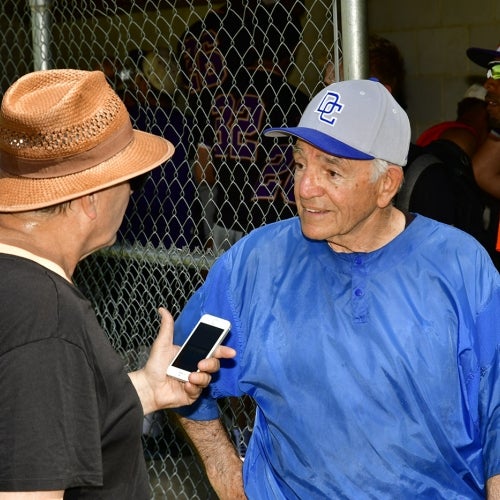 Coach Paul Motta being interviewed