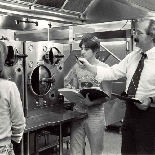 Old photo of the both the college and students