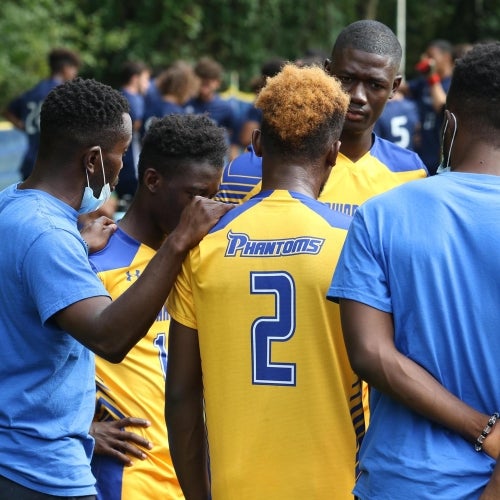 Men's Soccer huddle